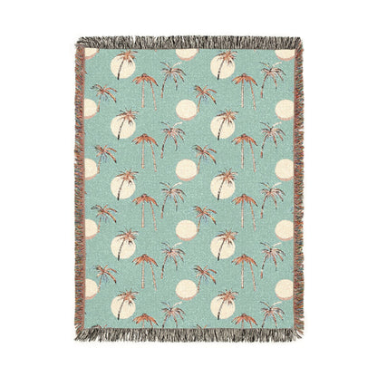 Summer palm woven blanket with tropical palm leaves, shown flat