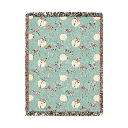 Summer palm woven blanket with tropical palm leaves, shown flat