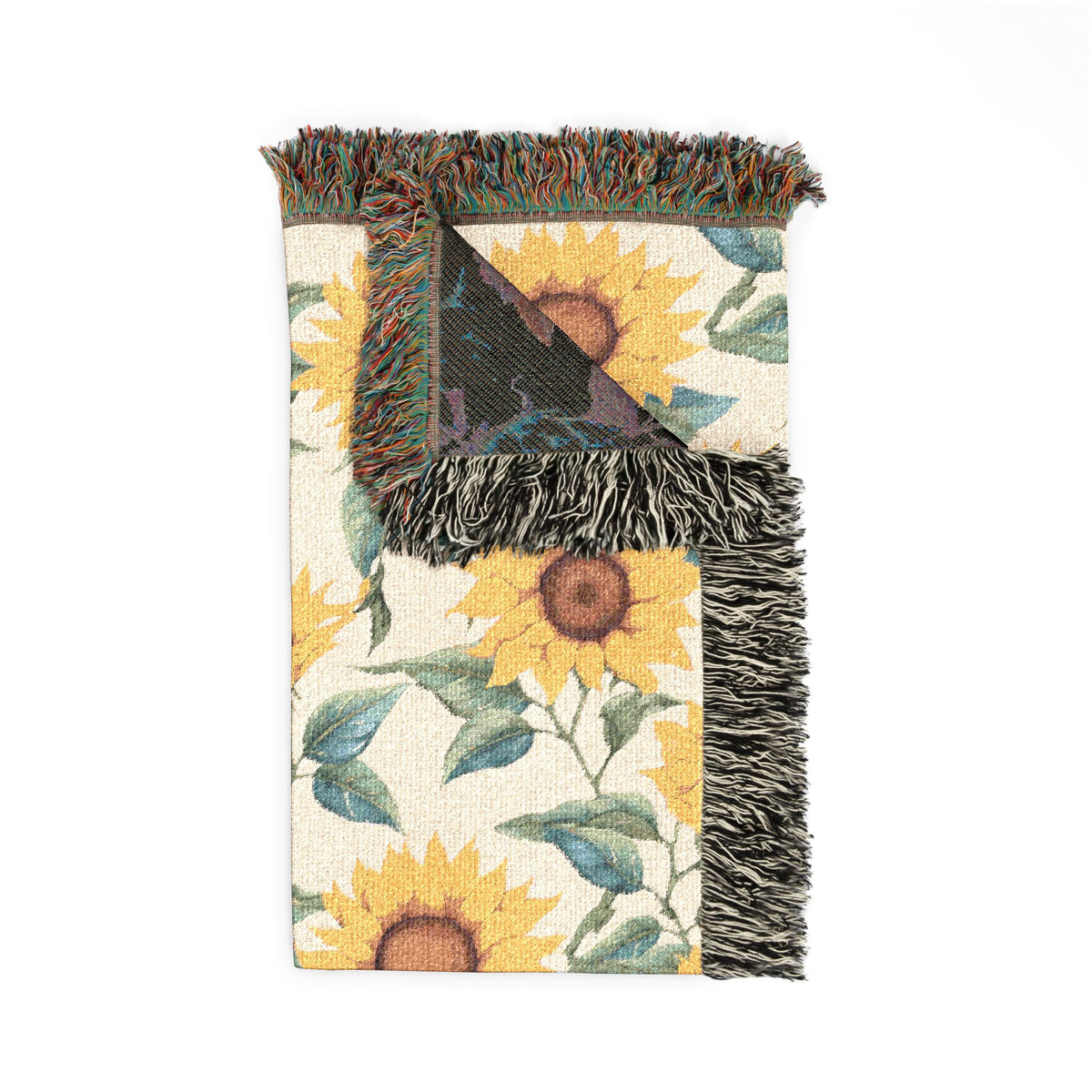 Folded Sunflower woven blanket showing the fringed edge and the teal reverse side