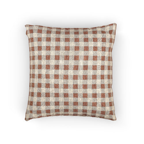Terracotta gingham woven pillow with a rust and cream check pattern