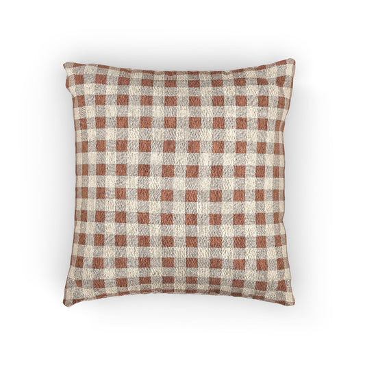 Terracotta gingham woven pillow with a rust and cream check pattern