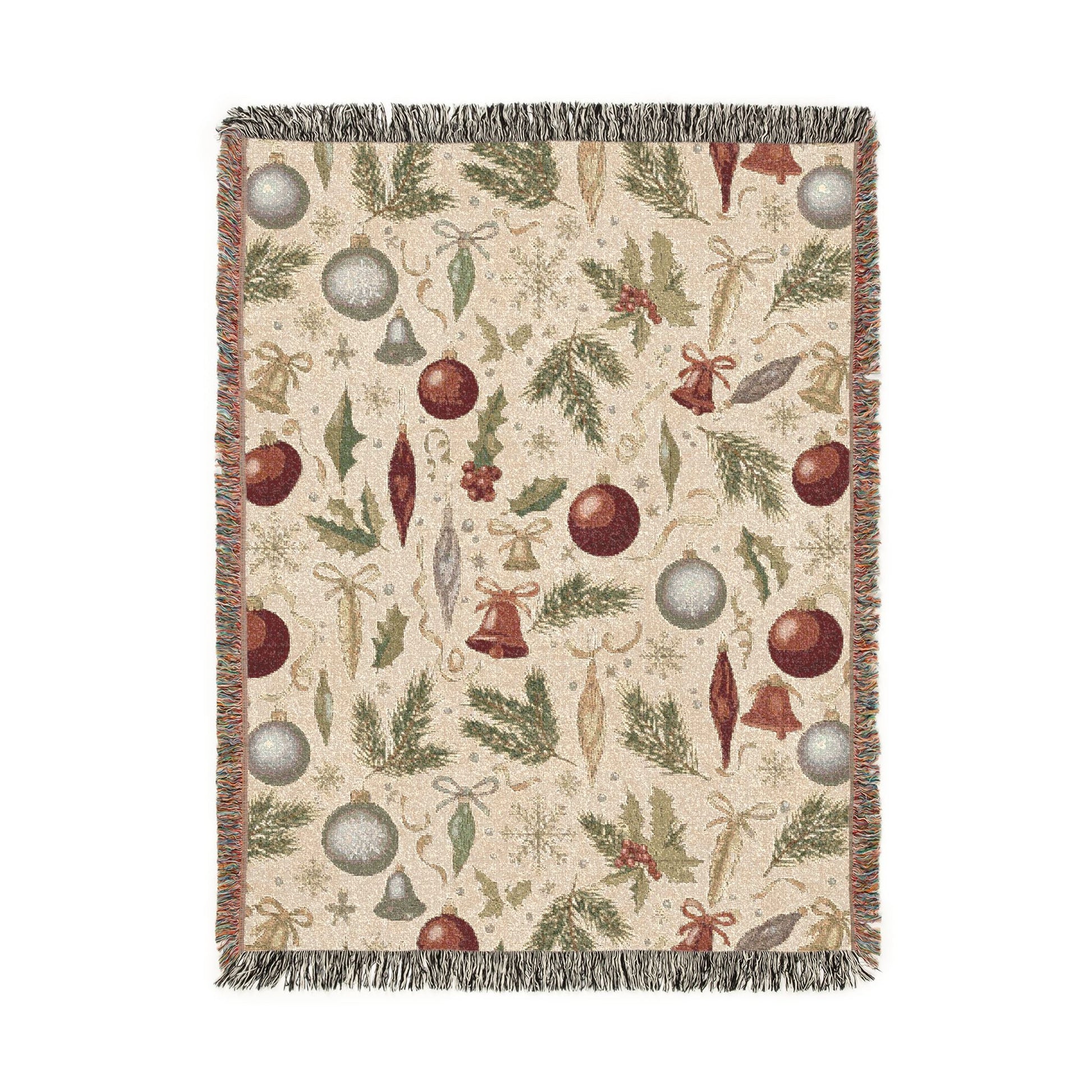 Vintage Christmas woven blanket with glass baubles, brass bells, holly and pine on cream