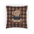 Vintage teddy bear woven pillow featuring a bear in a sweater on a buffalo plaid pattern