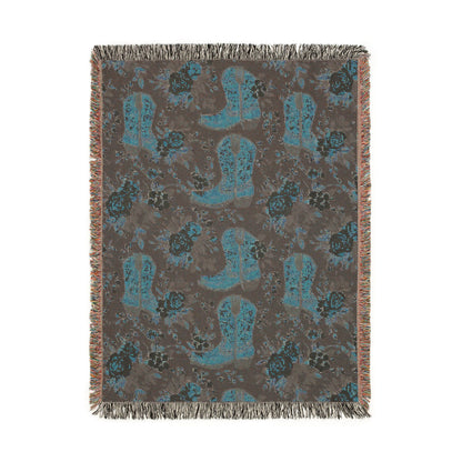 Reverse side of the Western woven blanket showing the same boots and roses pattern in teal and grey-green