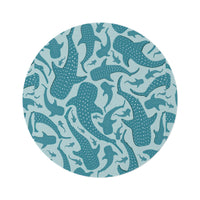 Whale Shark round rug in teal and pale blue with spotted whale sharks, shown flat