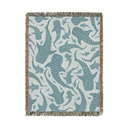 Whale Shark woven blanket in teal and cream with spotted whale sharks, shown flat