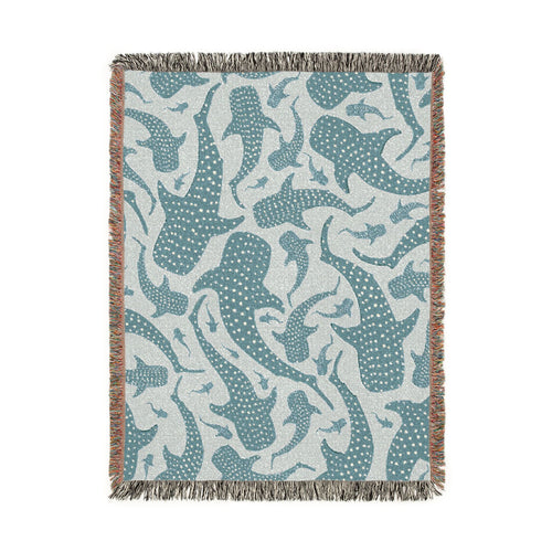 Whale Shark woven blanket in teal and cream with spotted whale sharks, shown flat