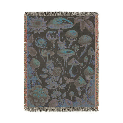 Wild Mushroom woven blanket draped over a chair in a cozy living room