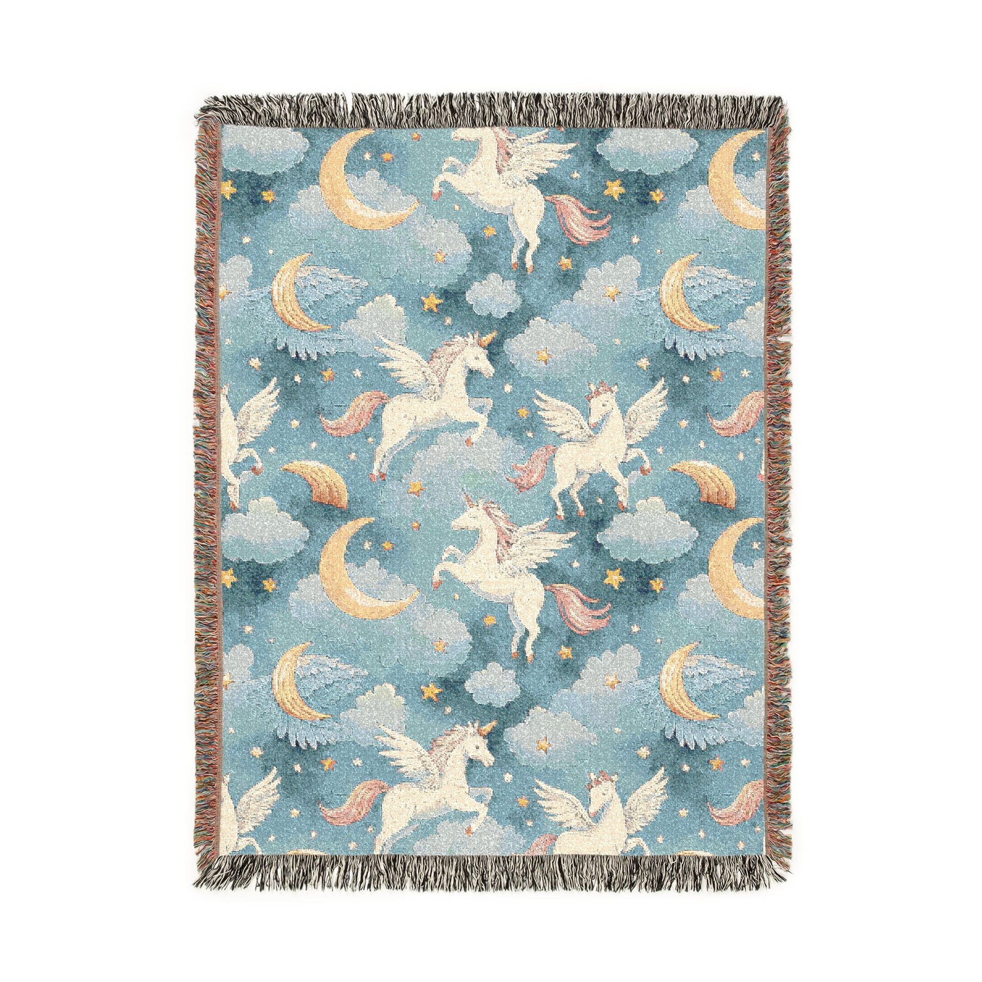 Woven blanket with cream winged unicorns, crescent moons, clouds and stars on a teal blue ground, shown flat
