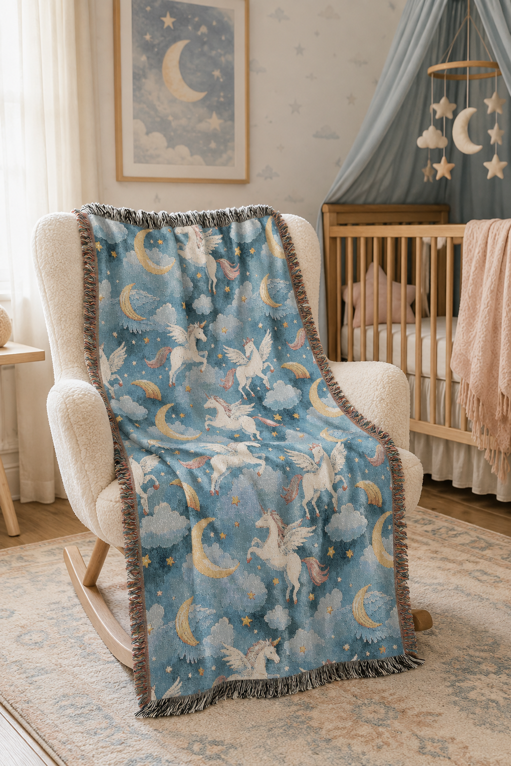 Winged unicorn woven blanket over a wooden crib beside a pale dresser in a nursery