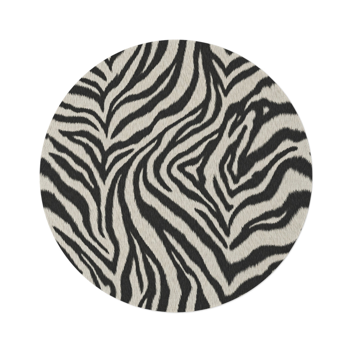 Zebra round rug in black and cream with a zebra stripe pattern, shown flat