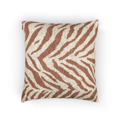 Woven pillow with rust and terracotta zebra stripes on a textured cream ground, front view